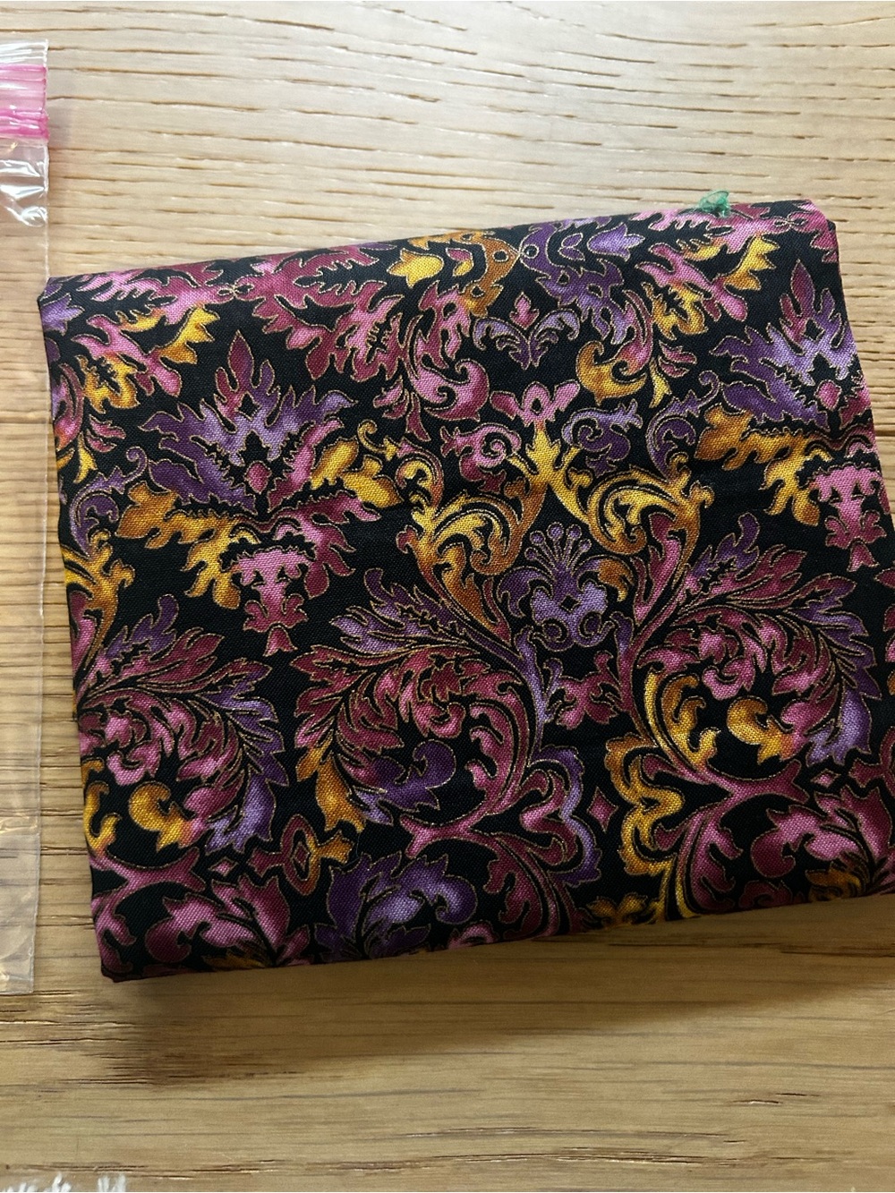 Decorative Baroque Print fabric in Black with Purple & Gold Accents